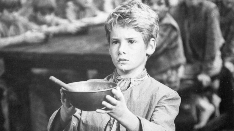 Oliver Twist asks for more gruel in 'Oliver!' (1968)
