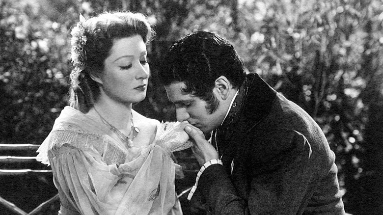 Mr. Darcy kisses Elizabeth Bennett's hand in 'Pride and Prejudice' (1940)