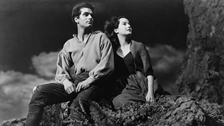 Heathcliff and Catherine sit on a mountaintop in 'Wuthering Heights' (1939)