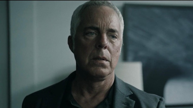 A tired-looking Bosch stands wearily in an apartment in "Bosch: Legacy" (2022-2025)