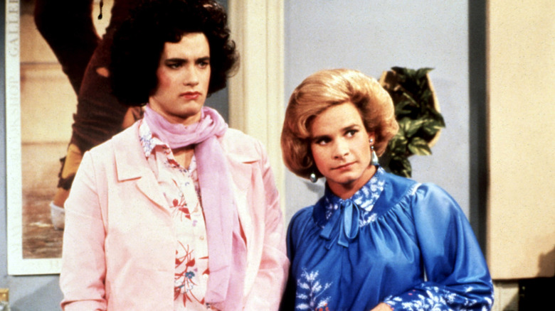 Hildy and Buffy looking serious in their apartment