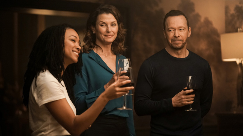 Lena, Danny and Erin toast the family in 