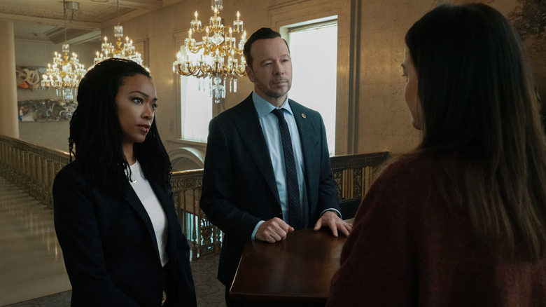 Lena and Danny interview a witness in "Boston Blue" (2025)