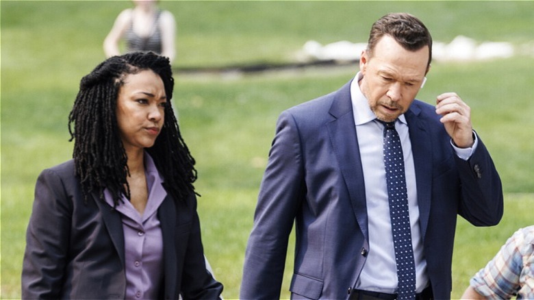 Danny and Lena walking outside together in 