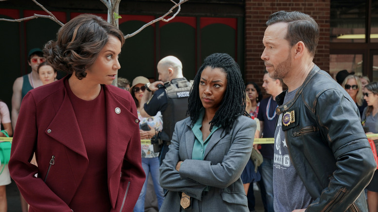 Lena, Danny and Mae converse on 