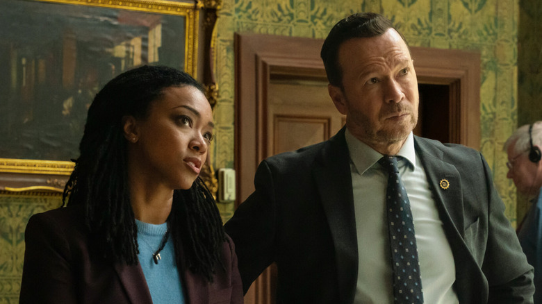 Lena and Danny staring at missing artwork in 