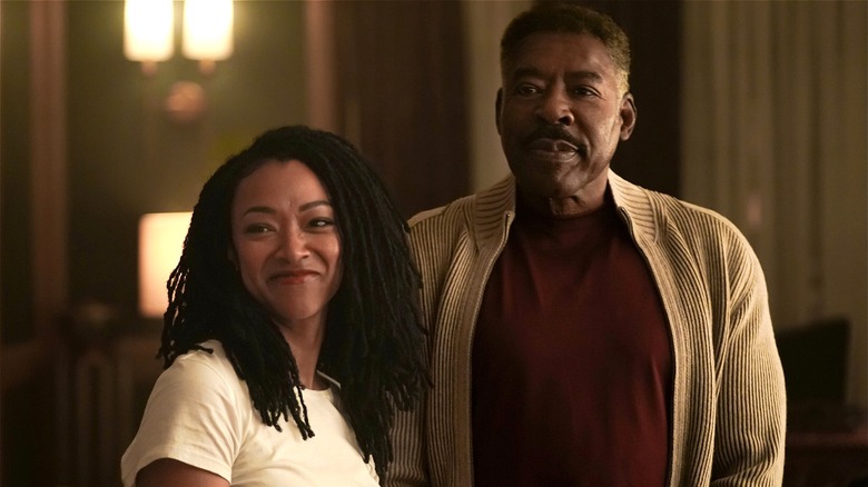Lena and Edwin smile in 