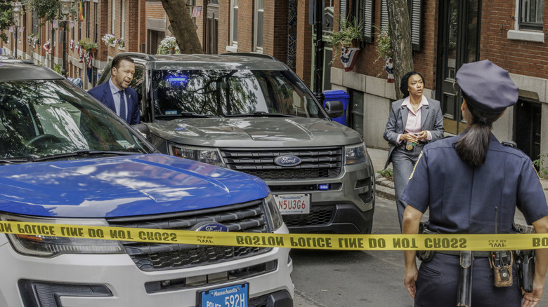 Danny Reagan and Lena Silver approach a crime scene in 