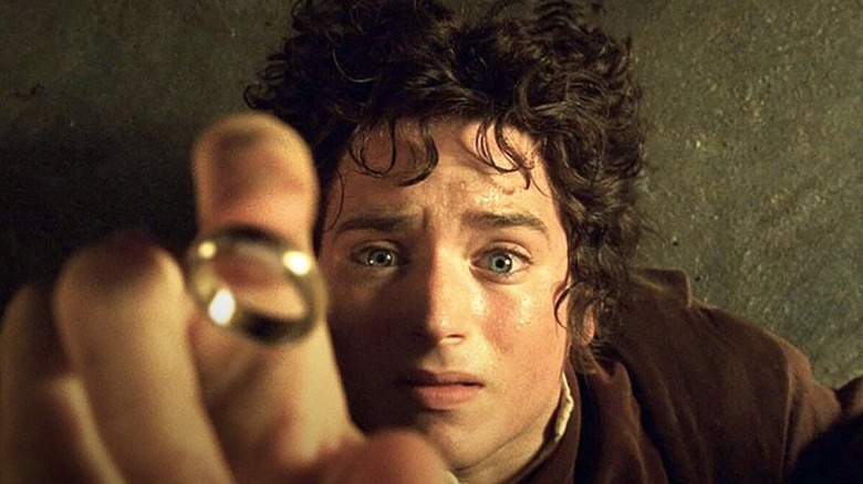 Frodo reaching out for The One Ring in The Lord of the Rings: The Fellowship of the Ring (2001)