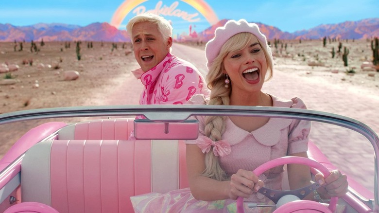 Ken and Barbie singing in a car in Barbie (2023)