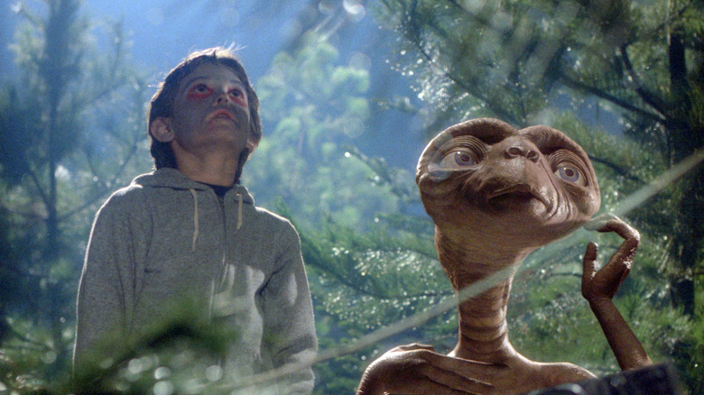 Elliot and E.T. looking up in E.T. the Extra-Terrestrial (1982)