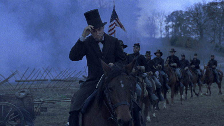 Abraham Lincoln walking through a battle's aftermath in Lincoln (2012)