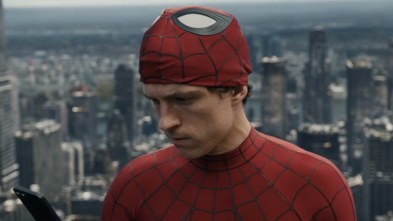Peter Parker looking at his phone in 