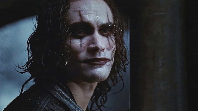 Eric Draven smiling in the rain