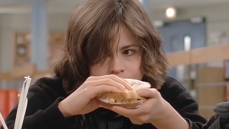 Allison eats a sandwich