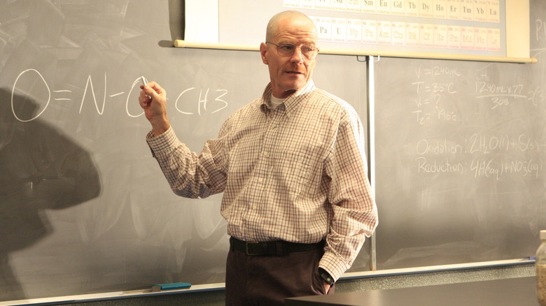 Walter White drawing an equation on the chalkboard