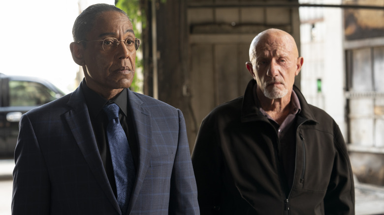 Gus and Mike standing side-by-side