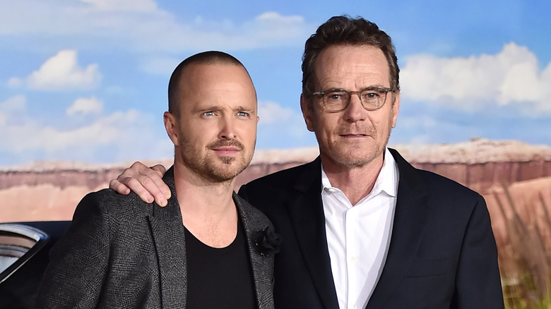 Aaron Paul and Bryan Cranston posing for a photo