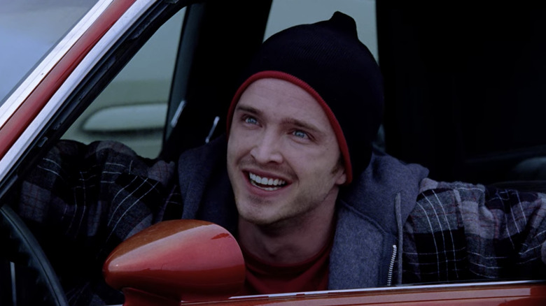 Jesse Pinkman smiling in a car