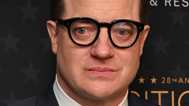 Brendan Fraser wearing black glasses