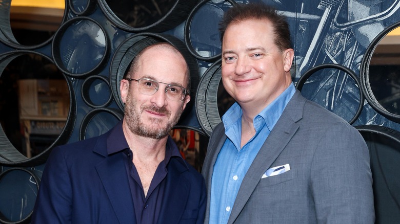 Aronofsky and Fraser pose together 