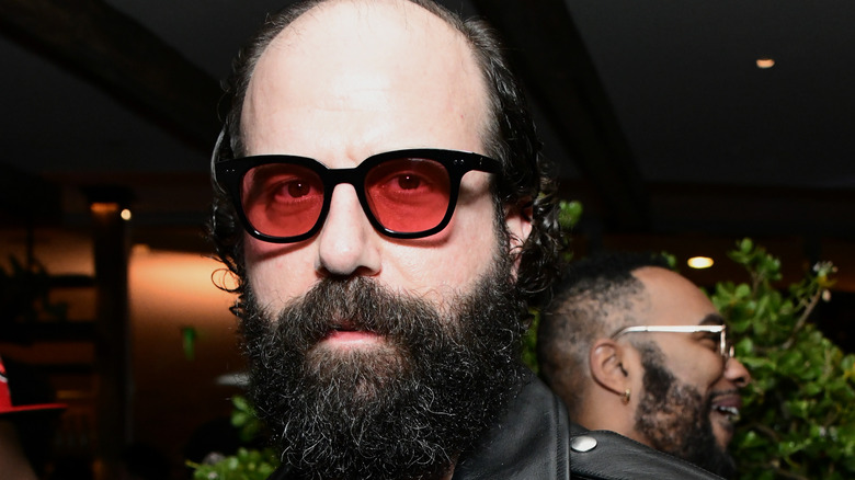 Brett Gelman with red glasses