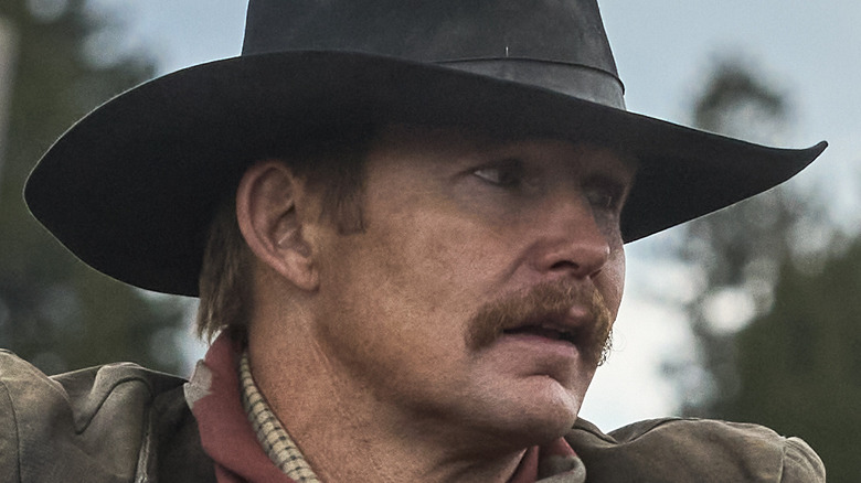 Brian Geraghty as Zane in cowboy hat in 1923