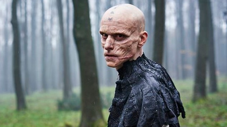 Britannia Mackenzie Crook as scarred Druid