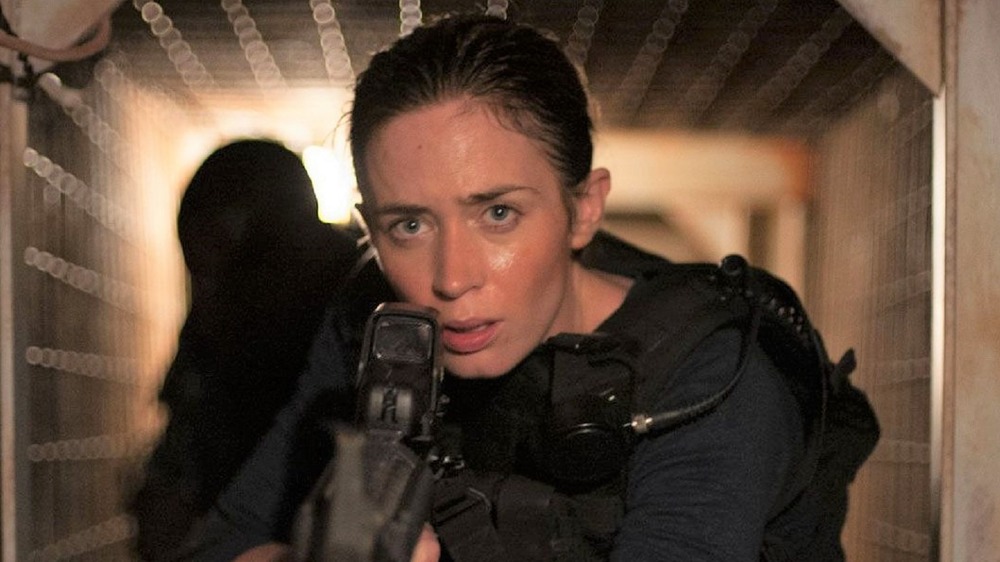 Emily Blunt with gun