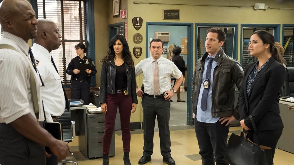 Brooklyn Nine-Nine officers standing in a circle