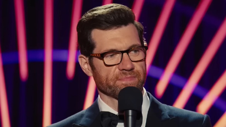 Bobby (Billy Eichner) smiles