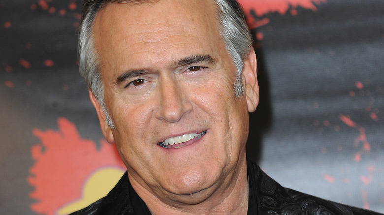 Bruce Campbell in leather jacket on red carpet