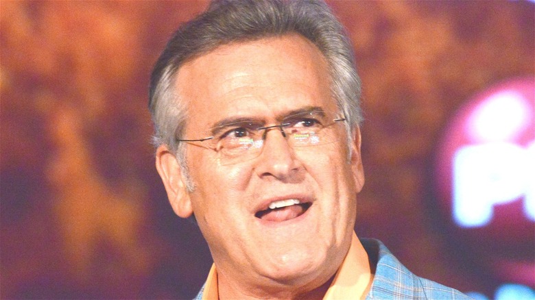 Bruce Campbell wearing glasses