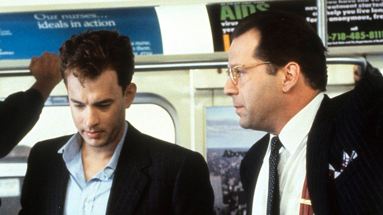 Peter and Sherman ride the subway in "The Bonfire of the Vanities" (1990)