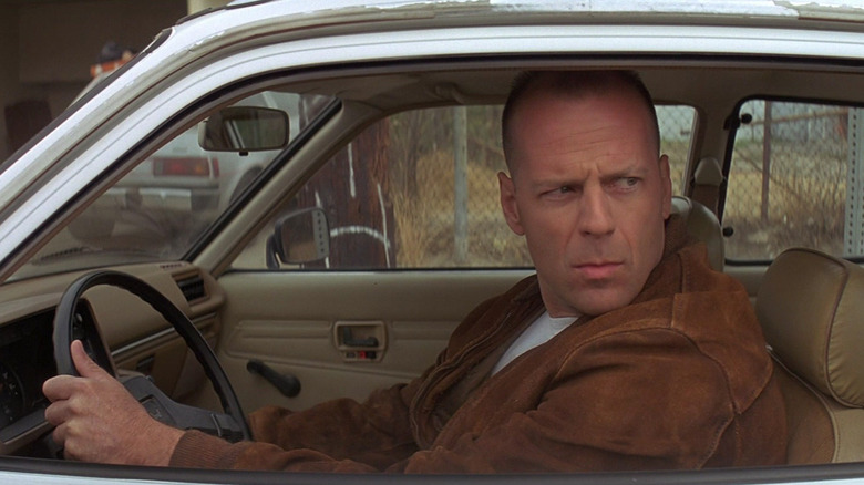Bruce Willis as Butch driving 