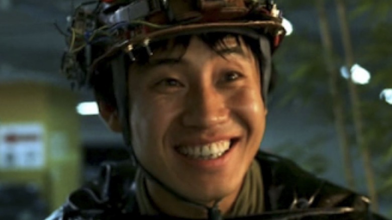 Byeong-gu smiles in "Save the Green Planet!" (2003)