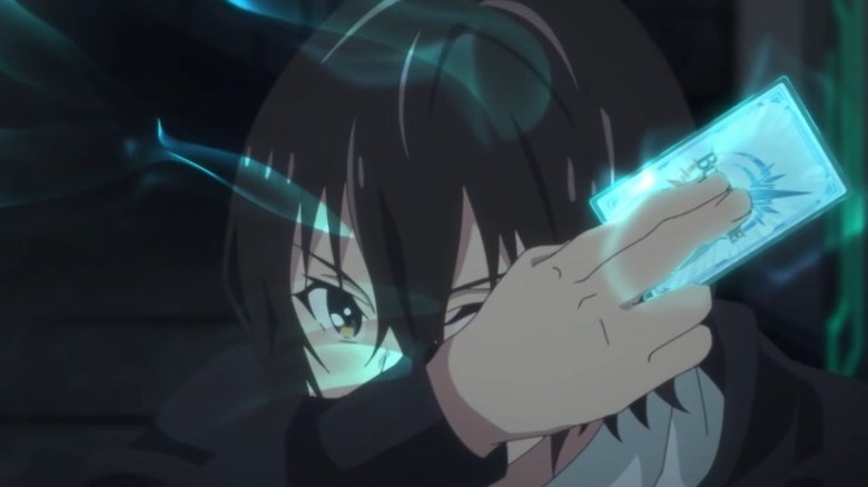 Teruto playing one of his cards