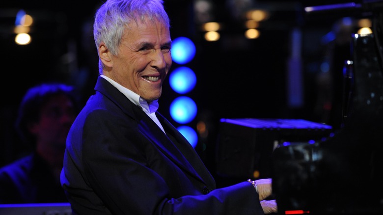 Burt Bacharach playing piano