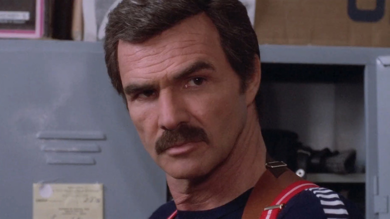 Tony Church staring with an eyebrow slightly raised in Rent-a-Cop