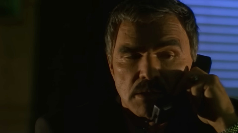 Mentor speaking on the phone in Universal Soldier II: Brothers in Arms