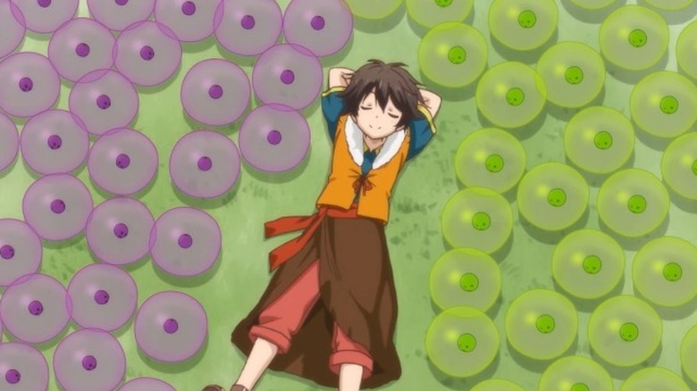 Ryoma in a field with his slime creatures
