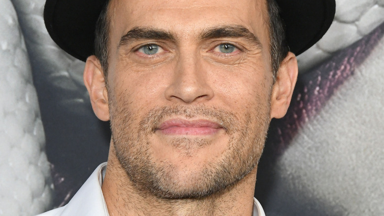 Cheyenne Jackson wearing black hat