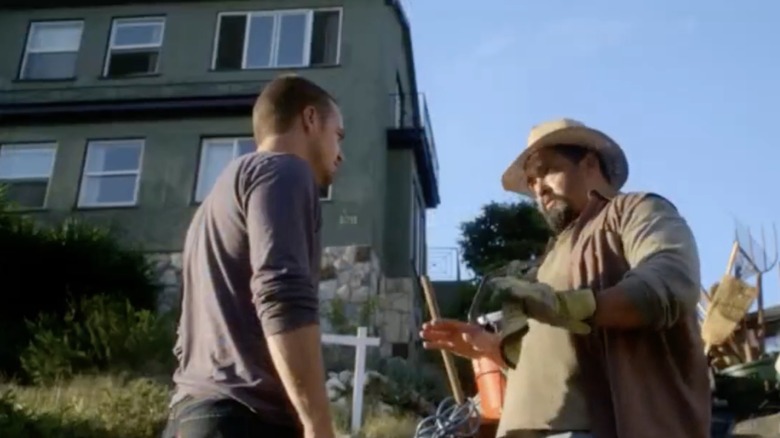 Callen talking to man