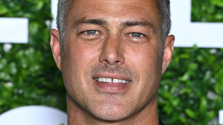 Taylor Kinney smiling 