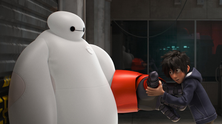 Hiro getting Baymax suited up in Big Hero 6 (2014)