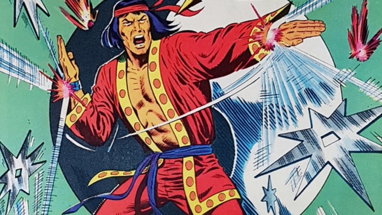 Shang-Chi deflecting shuriken on the cover of "The Hands of Shang-Chi: Master of Kung Fu" #41