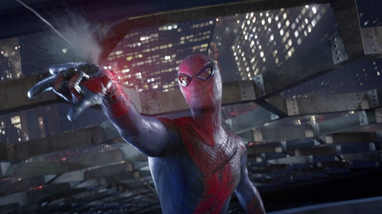 Spider-Man shooting some web as he falls from a building in The Amazing Spider-Man