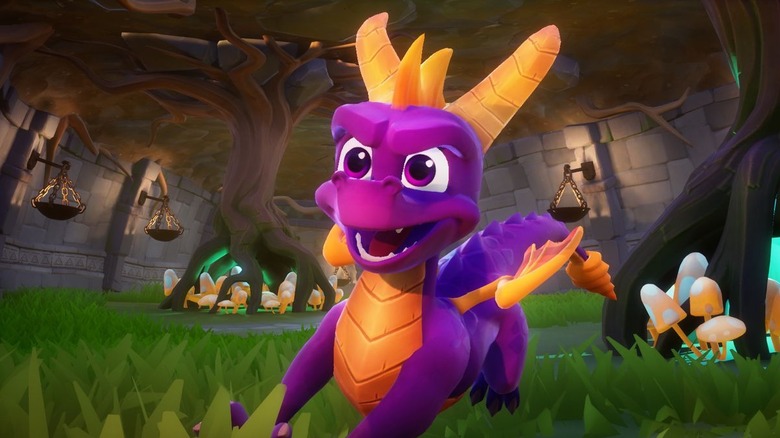Spyro charging across a grassy world in "Spyro Reignited Trilogy"