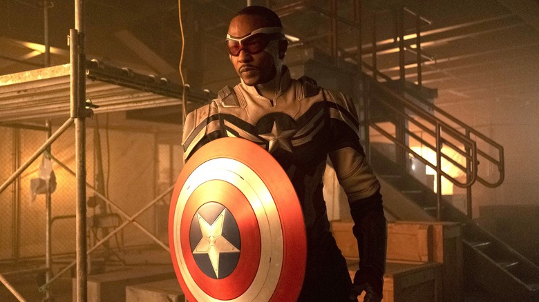 Sam Wilson holds shield