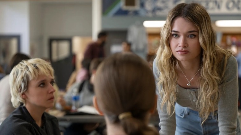 Emaline looking on as Chris attacks Carrie in Carrie (2026)